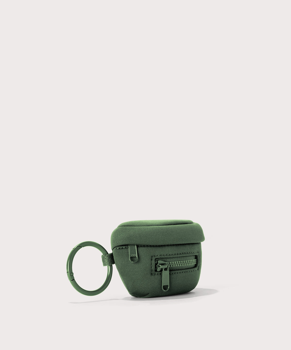 Dagne Dover Ace Keychain in a rich, classic forest green seen from an angle.
