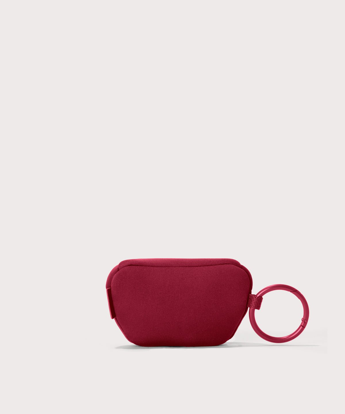 Dagne Dover Ace Keychain in a punchy, saturated deep red seen from the back.
