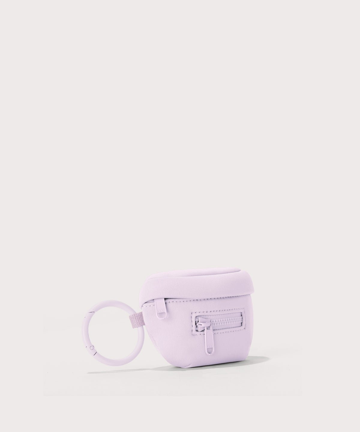 Dagne Dover Ace Keychain in a soft purple with grey undertones seen from an angle.
