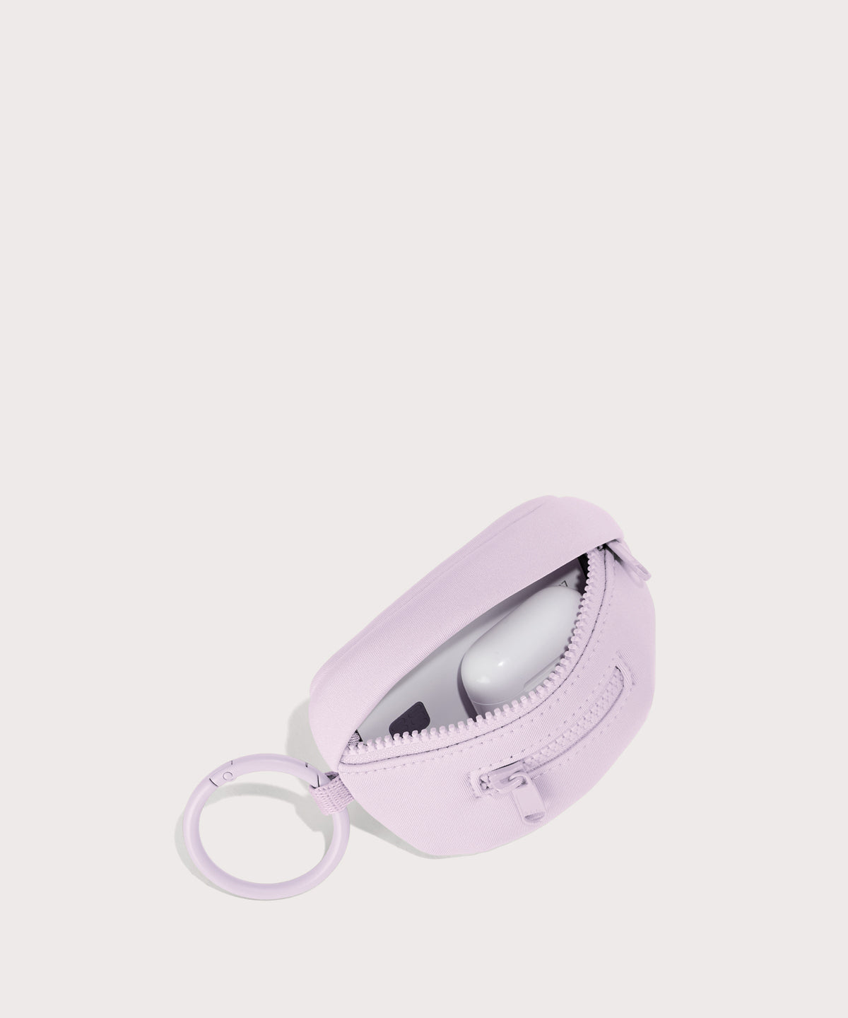 Dagne Dover Ace Keychain in a soft purple with grey undertones unzipped, showing interior.
