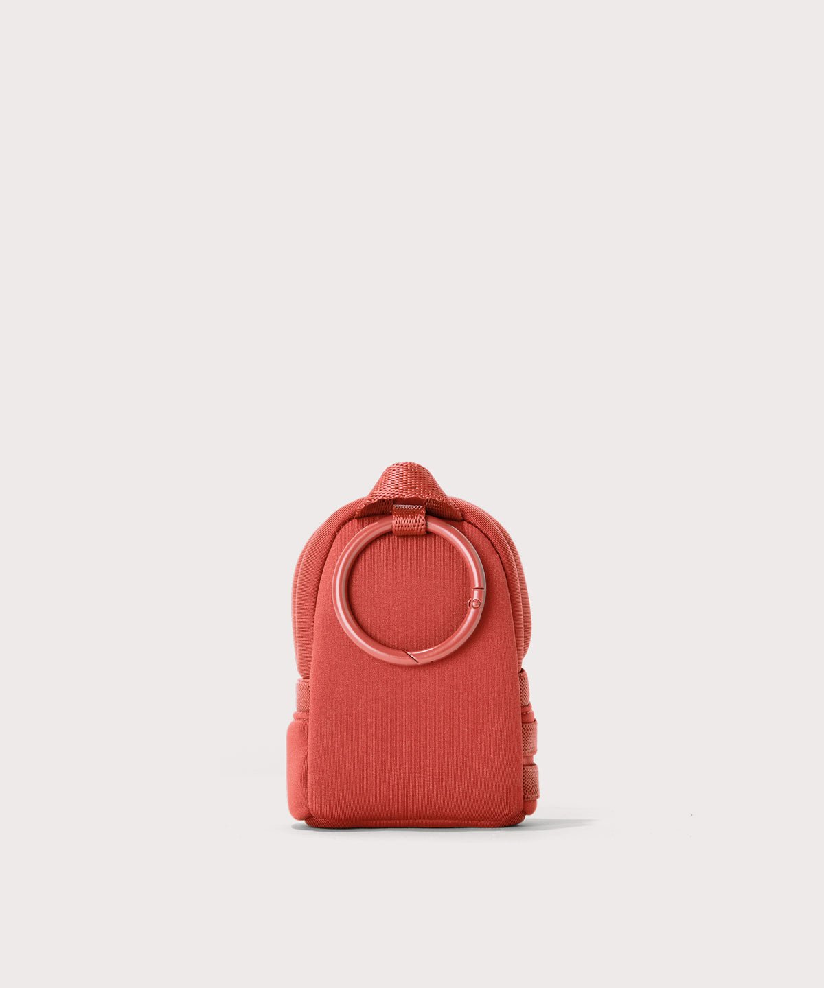 Dagne Dover Dakota Keychain in  a poppy, vintage wash red seen from the back.

