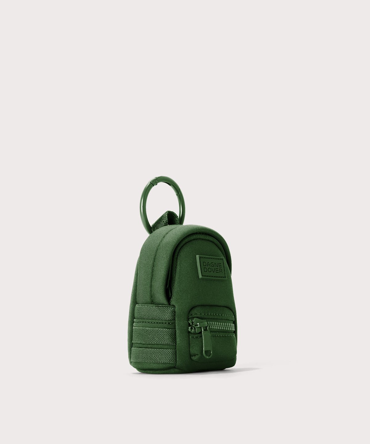 Dagne Dover Dakota Keychain in a rich, classic forest green seen from an angle.
