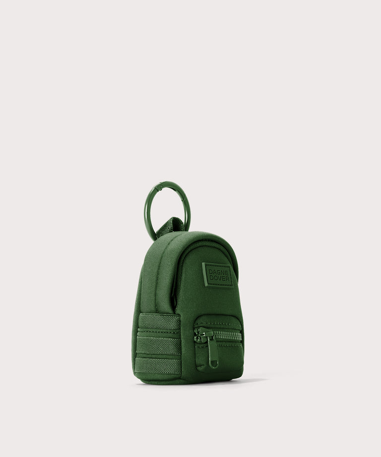 Dagne Dover Dakota Keychain in a rich, classic forest green seen from an angle.
