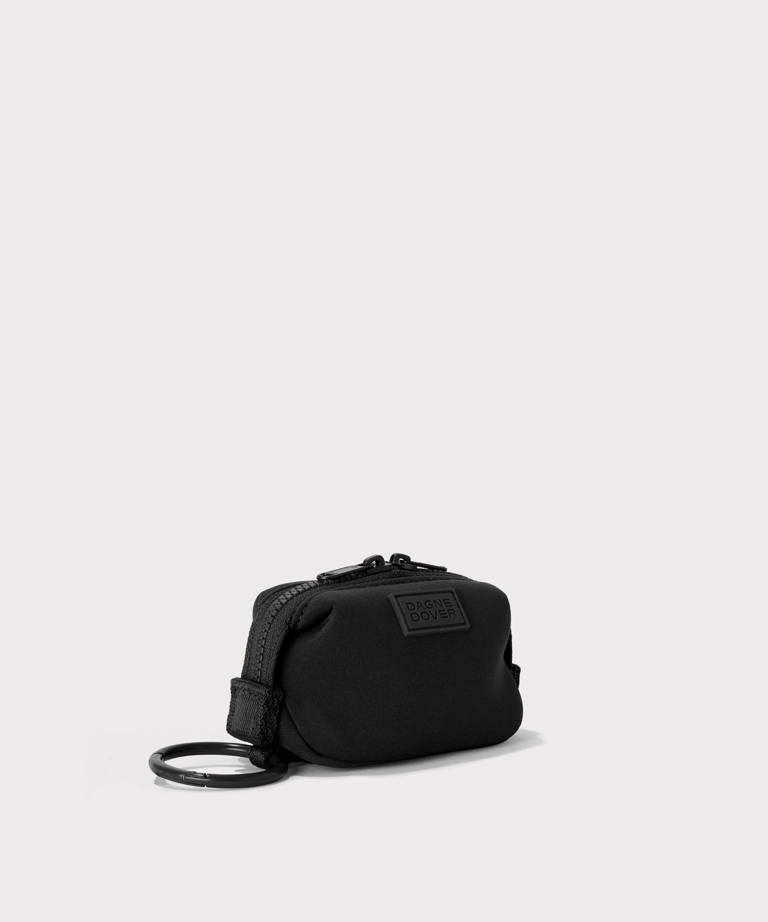 Dagne Dover Hunter Keychain in black seen from an angle.
