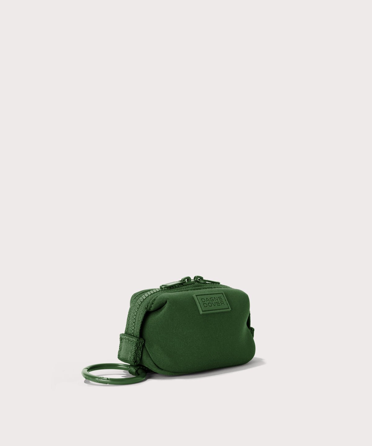 Dagne Dover Hunter Keychain in a rich, classic forest green seen from an angle.
