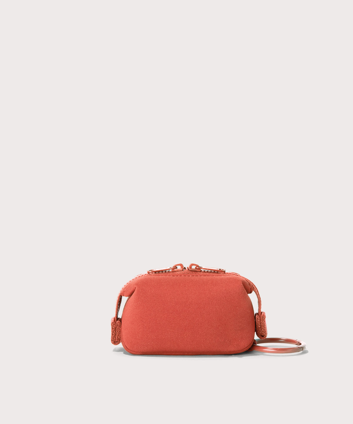 Dagne Dover Hunter Keychain in a poppy, vintage wash red seen from the back.
