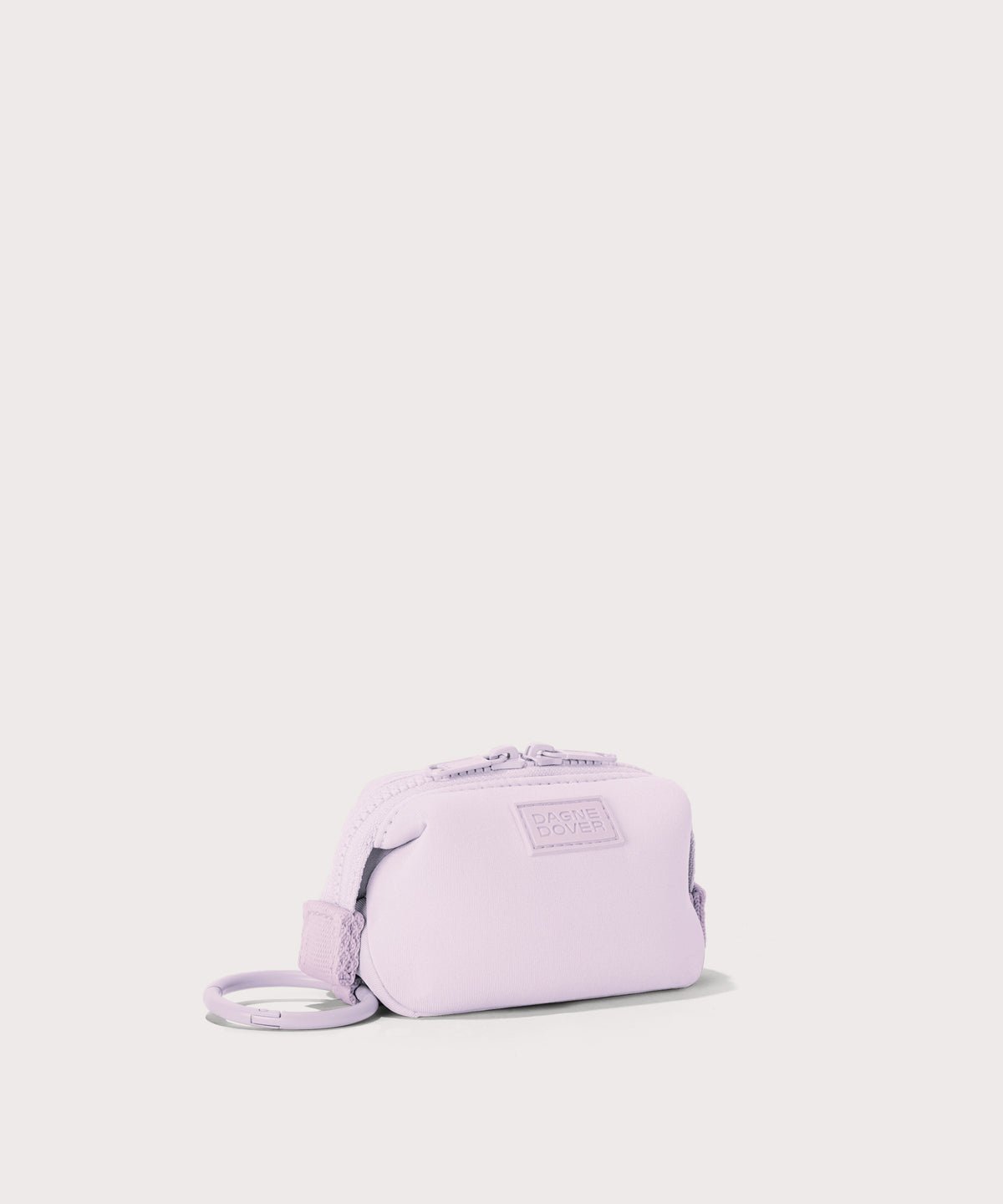 Dagne Dover Hunter Keychain in a soft purple with grey undertones. seen from an angle.
