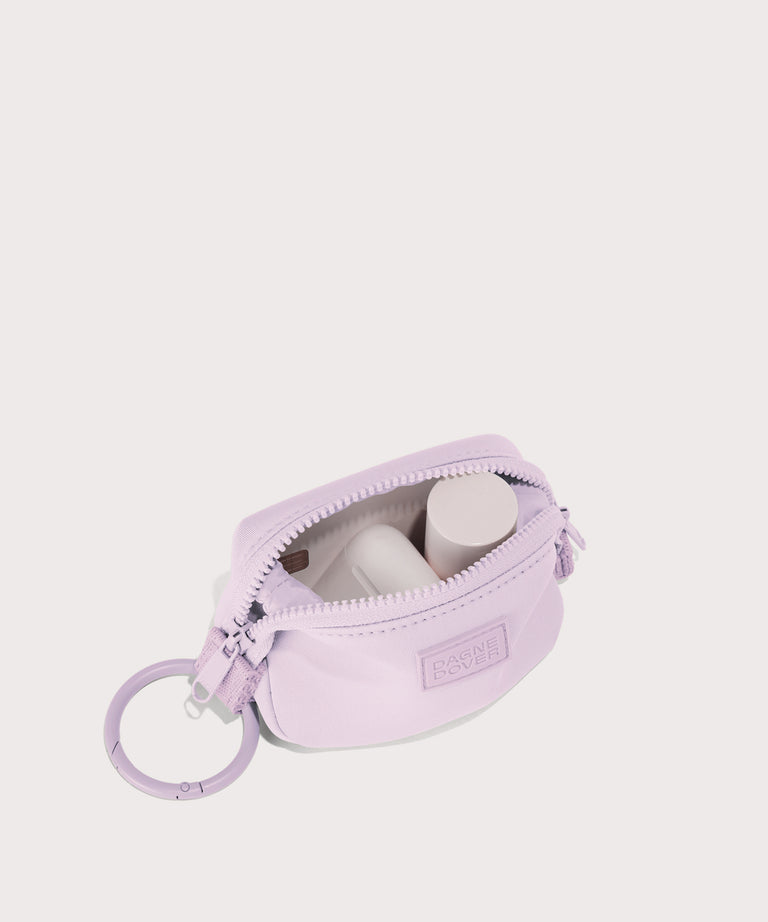 Dagne Dover Hunter Keychain in a soft purple with grey undertones. unzipped, showing interior.
