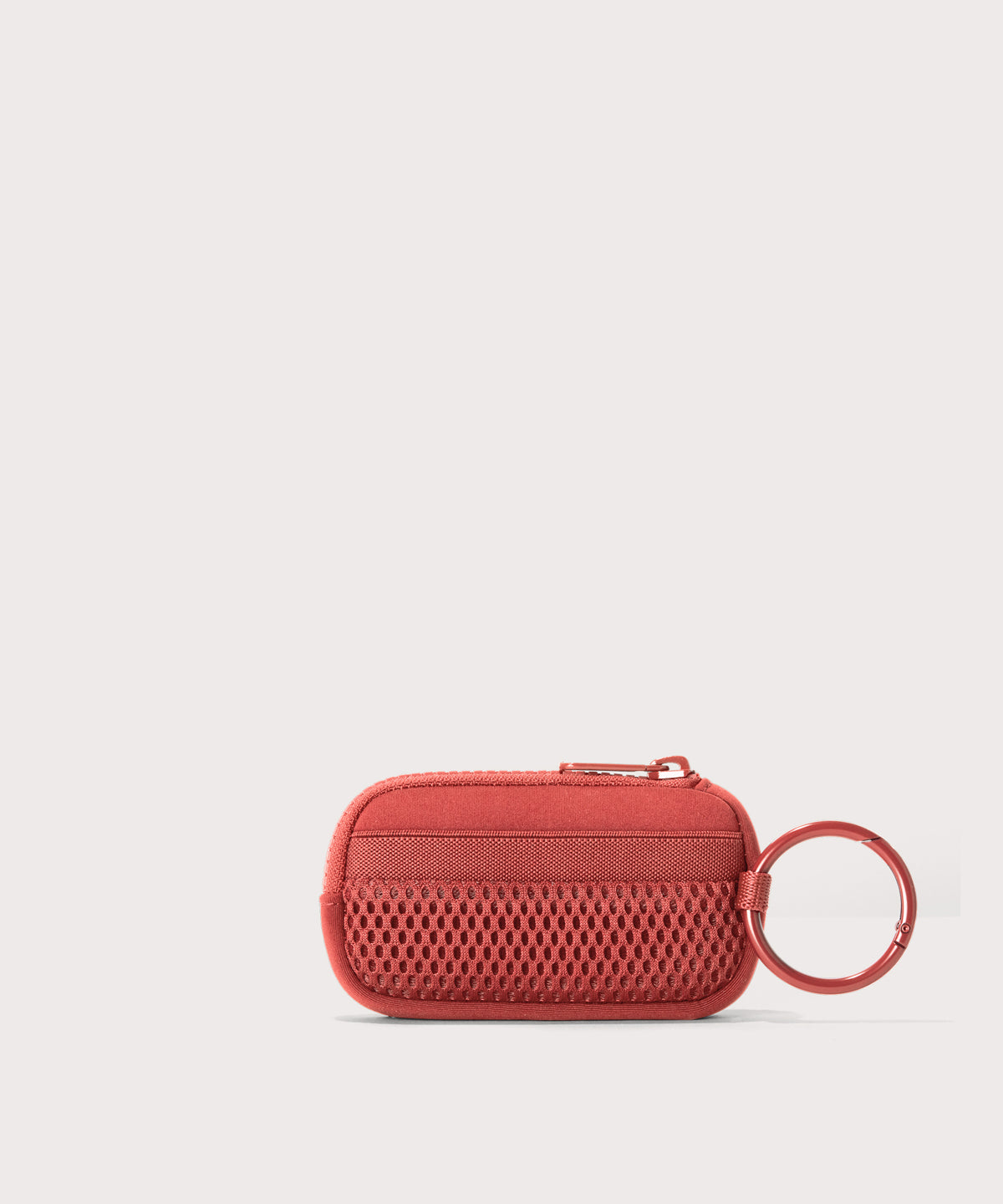 Dagne Dover Mara Keychain in a poppy, vintage wash red seen from the back.
