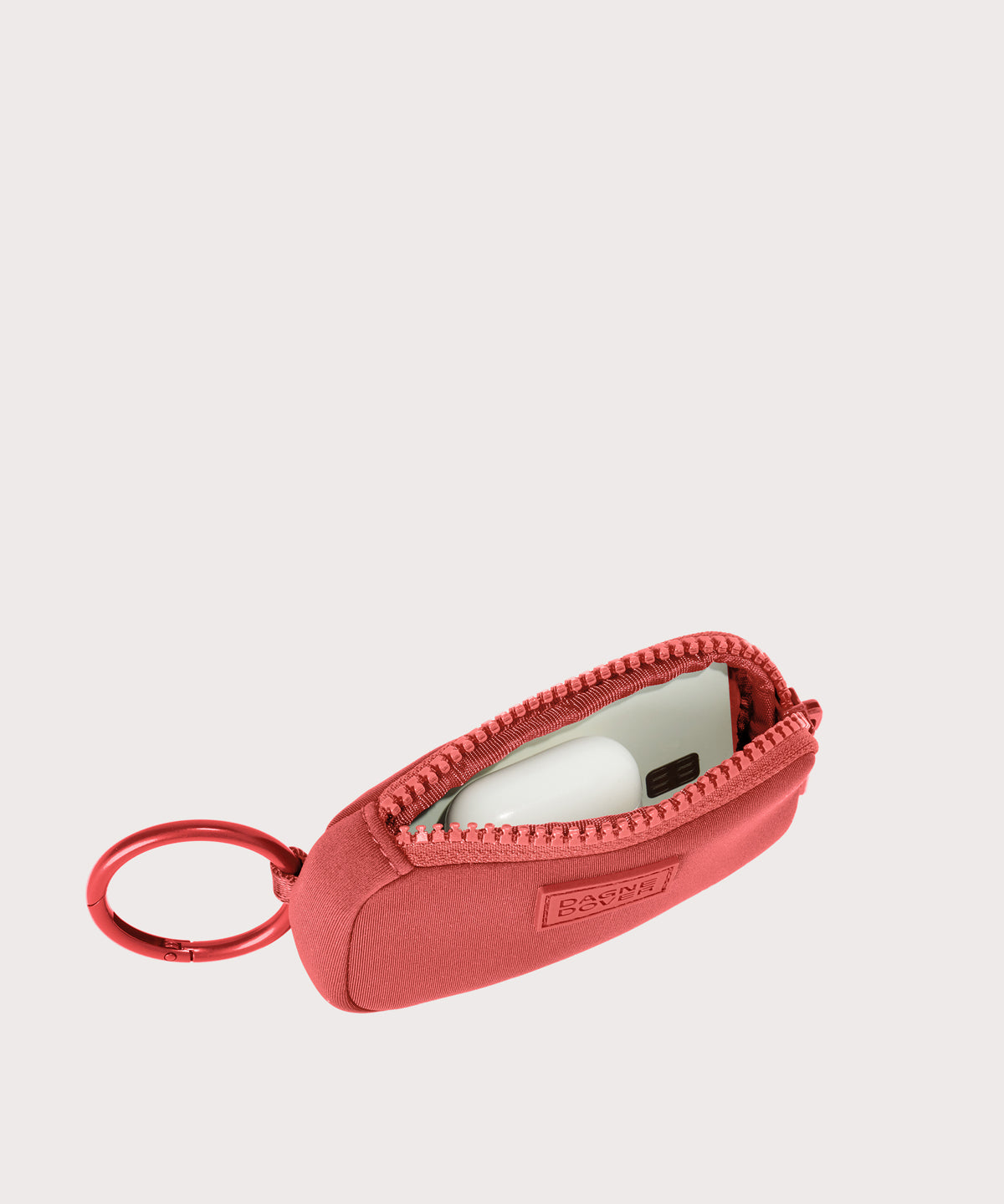 Dagne Dover Mara Keychain in a poppy, vintage wash red unzipped, showing interior.
