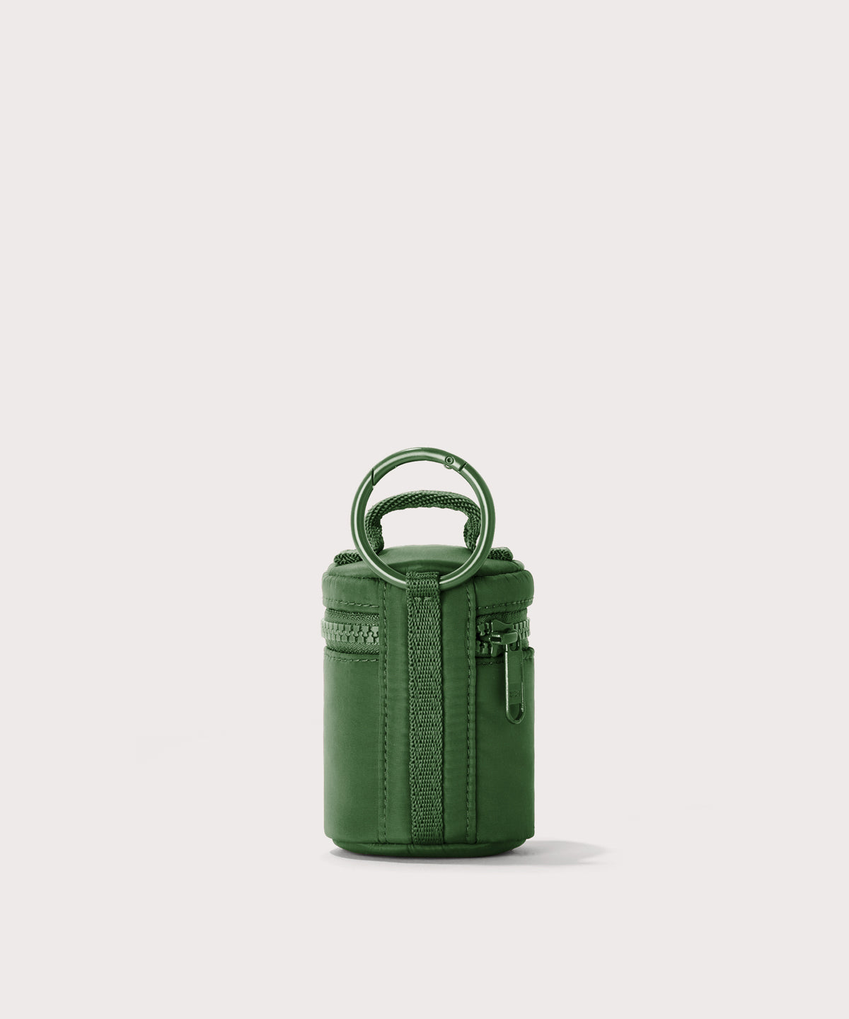 Dagne Dover Mila Keychain in a a rich, classic forest green seen from the back.
