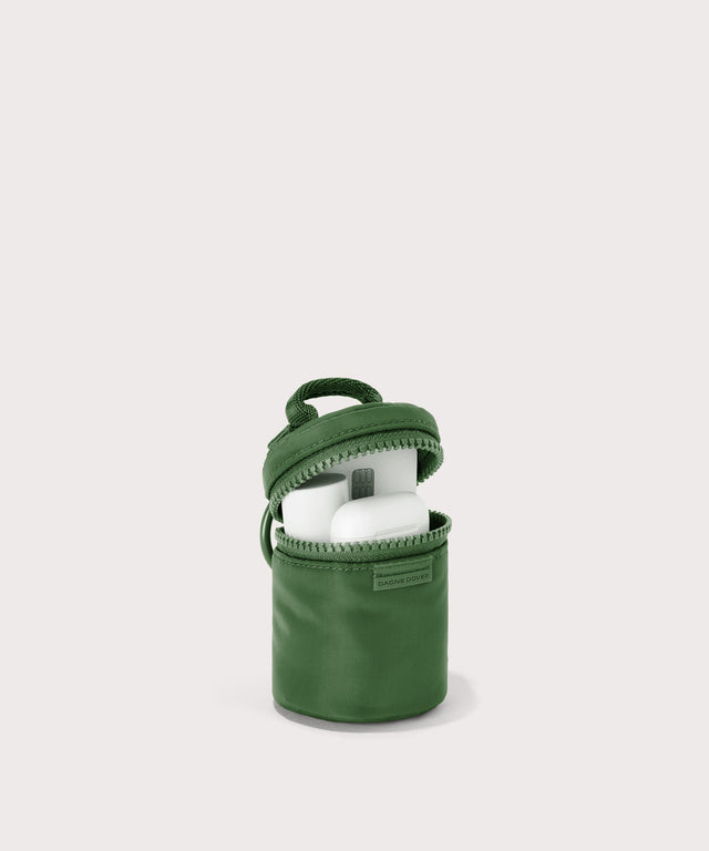 Dagne Dover Mila Keychain in a a rich, classic forest green unzipped, showing interior.
