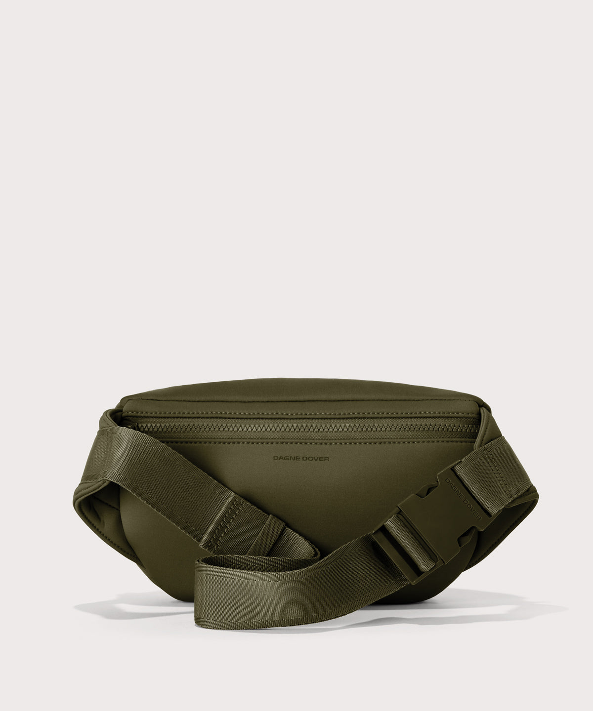 Dagne Dover jax large fanny pack in dark moss seen from the back.
