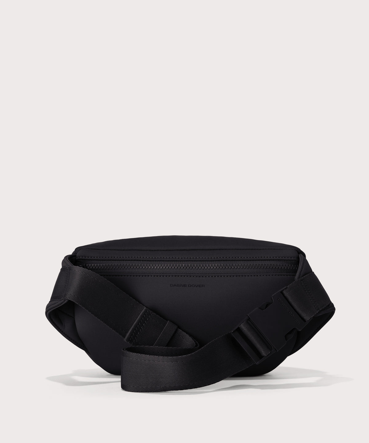 Dagne Dover jax large fanny pack in black seen from the back.
