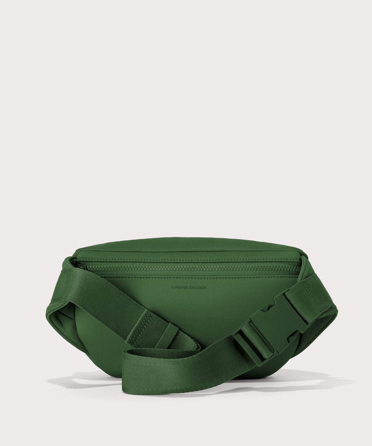 Dagne Dover jax large fanny pack in  a rich, classic forest green seen from the back.
