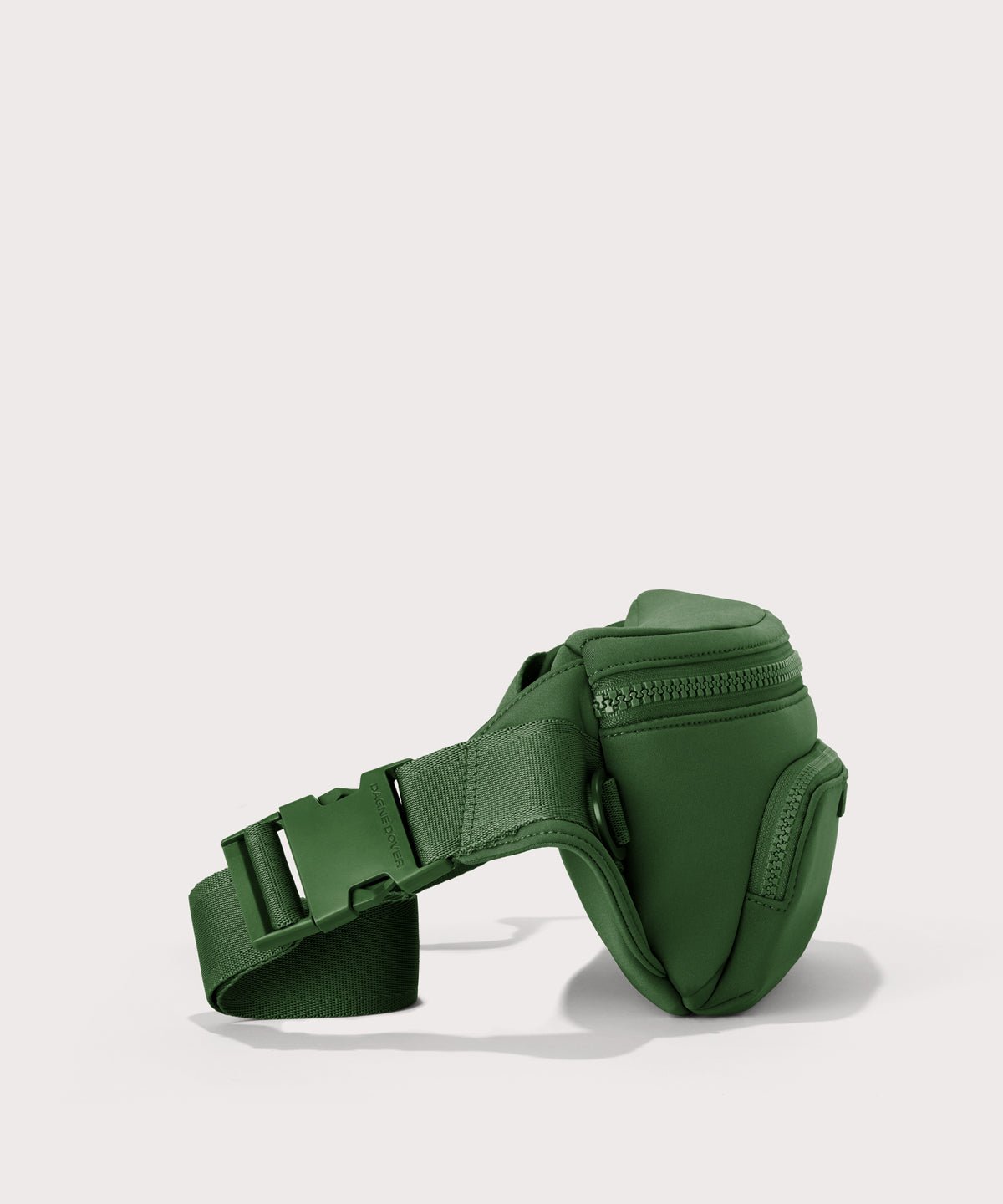 Dagne Dover jax large fanny pack in  a rich, classic forest green seen from an angle.
