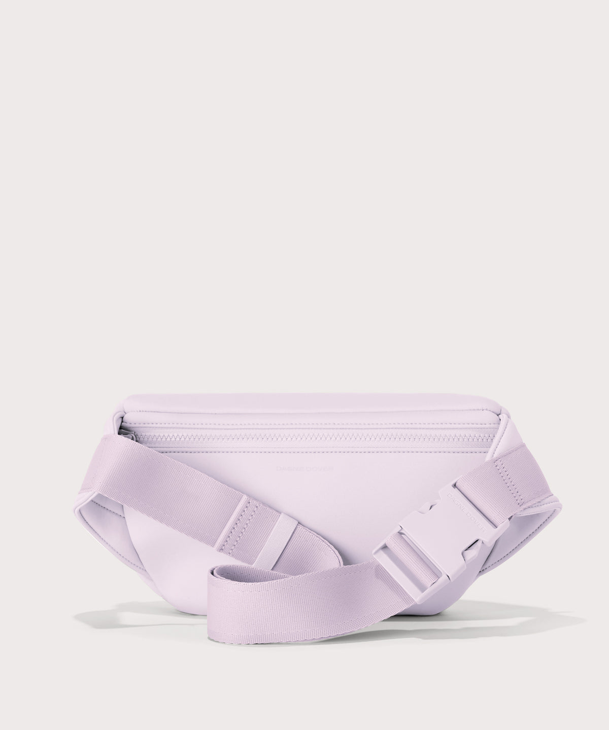 Dagne Dover jax large fanny pack in a soft purple with grey undertones seen from the back.
