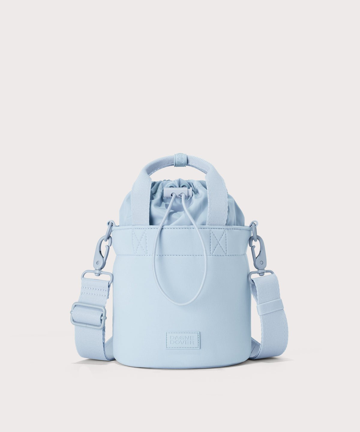 Dagne Dover Nico Bucket Bag in an airy, lighter sky blue.
