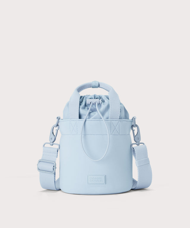 Dagne Dover Nico Bucket Bag in an airy, lighter sky blue.
