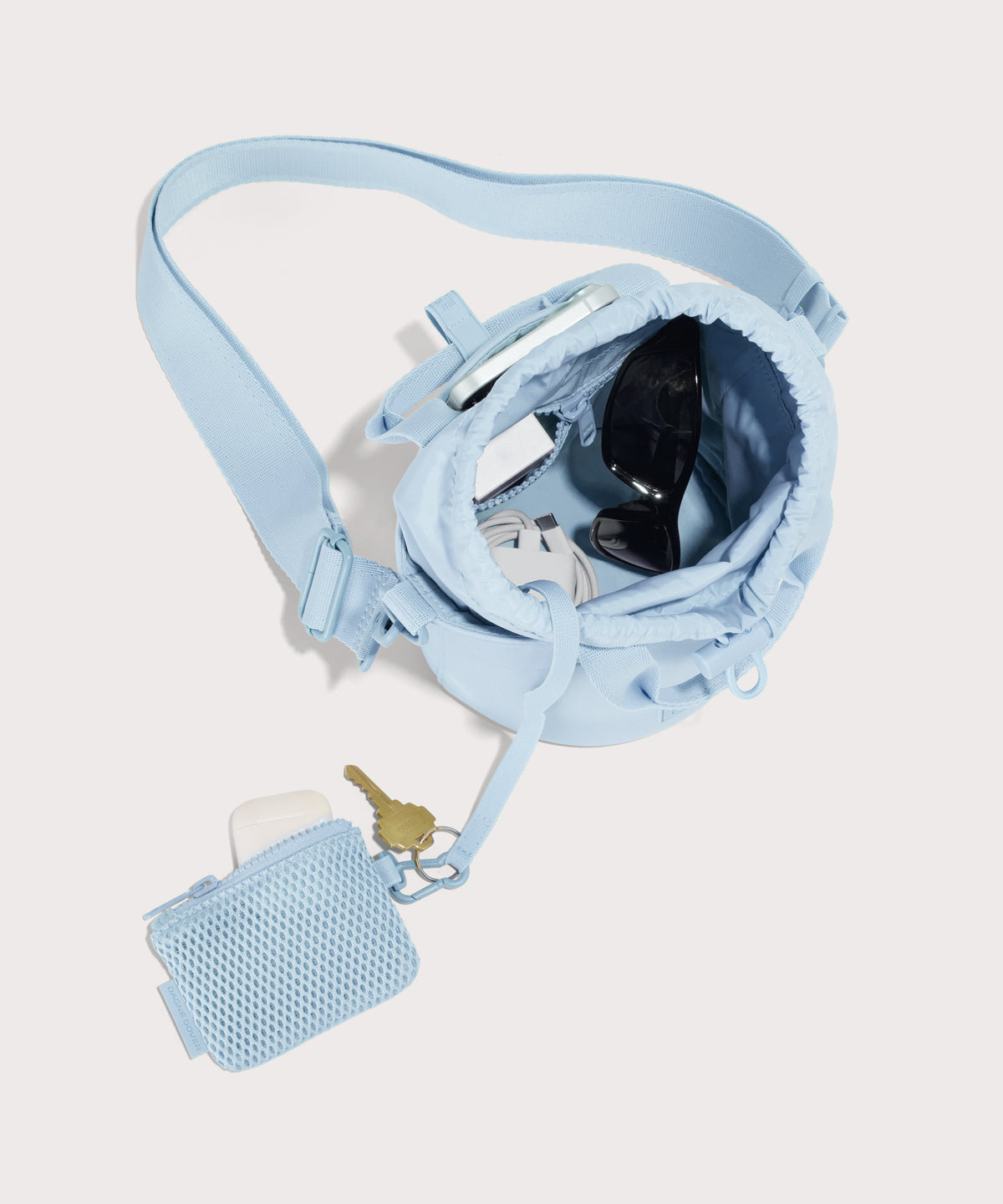Dagne Dover Nico Bucket Bag in an airy, lighter sky blue, topdown.