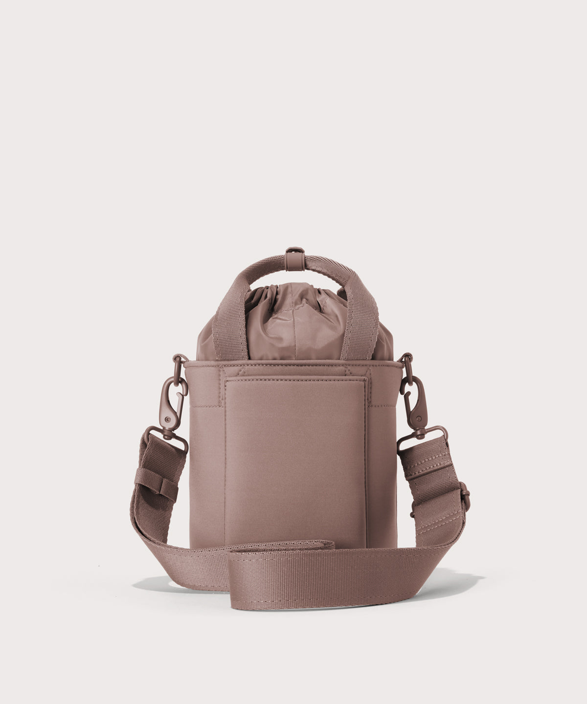 Dagne Dover Nico Bucket Bag in pink, back angle.
