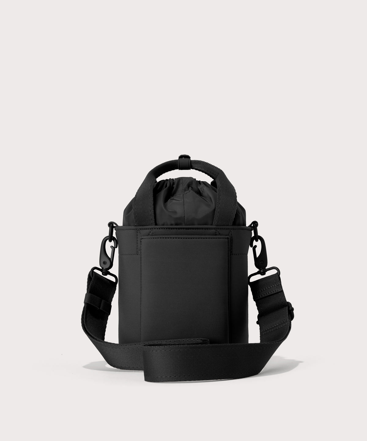 Dagne Dover Nico Bucket Bag in black, back angle.

