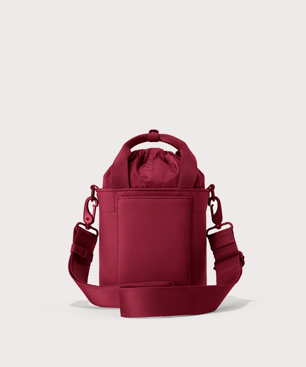 Dagne Dover Nico Bucket Bag in Spice, back angle.
