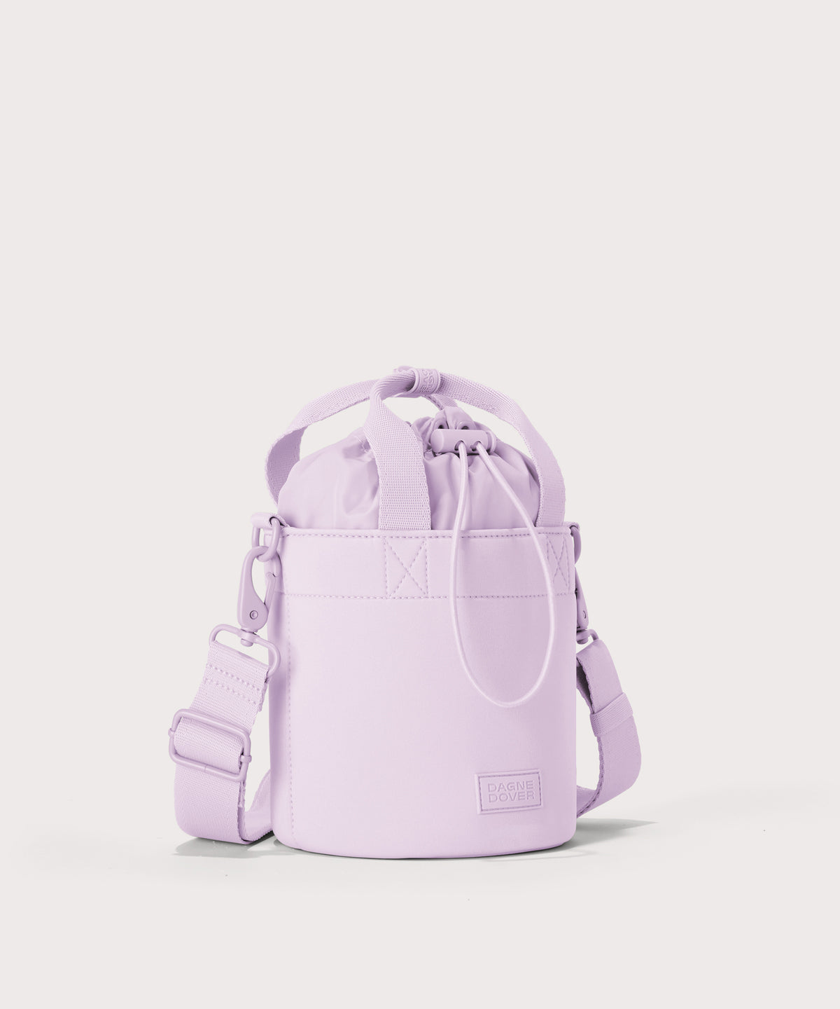 Dagne Dover Nico Bucket Bag in a soft purple with grey undertones, side angle.
