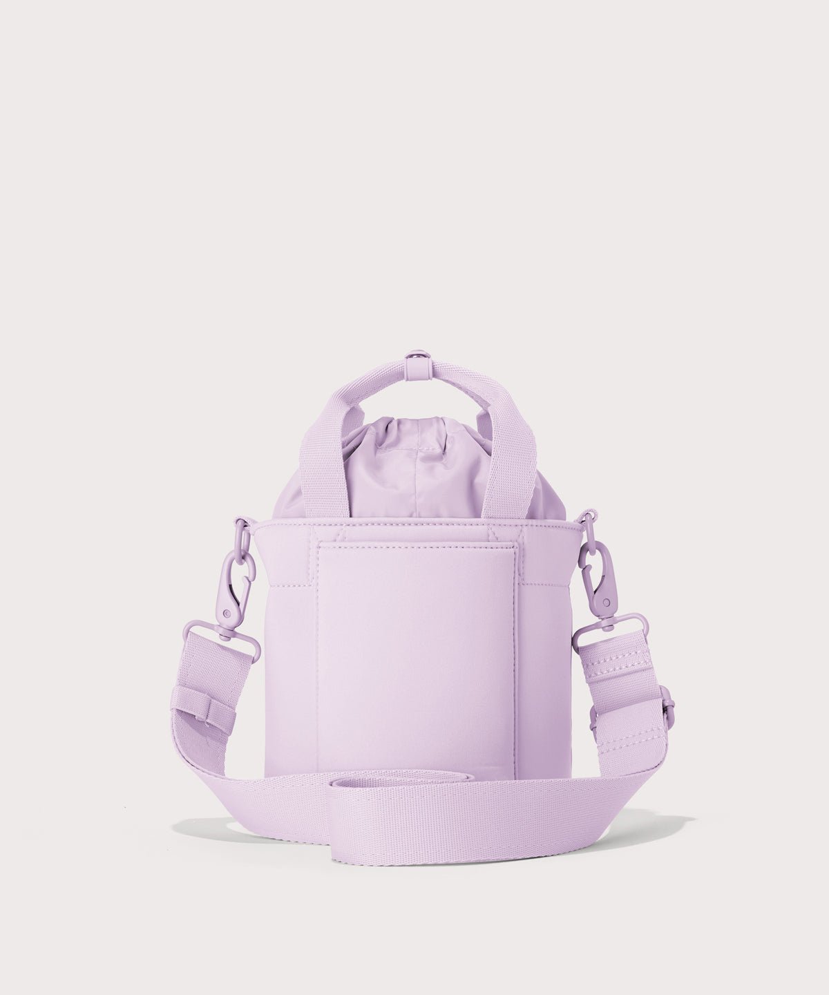 Dagne Dover Nico Bucket Bag in a soft purple with grey undertones, back angle.
