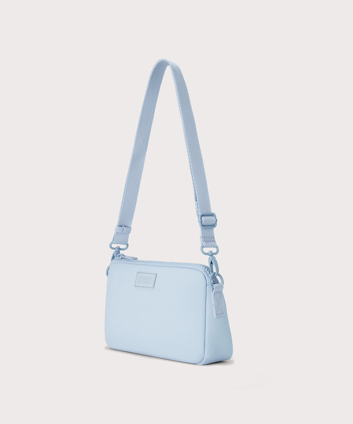 Dagne Dover Nora Shoulder Bag in an airy, lighter sky blue, side angle.
