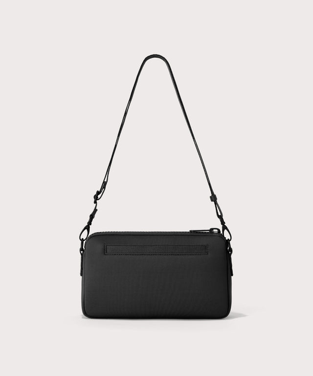 Dagne Dover Nora Shoulder Bag in black, back angle.
