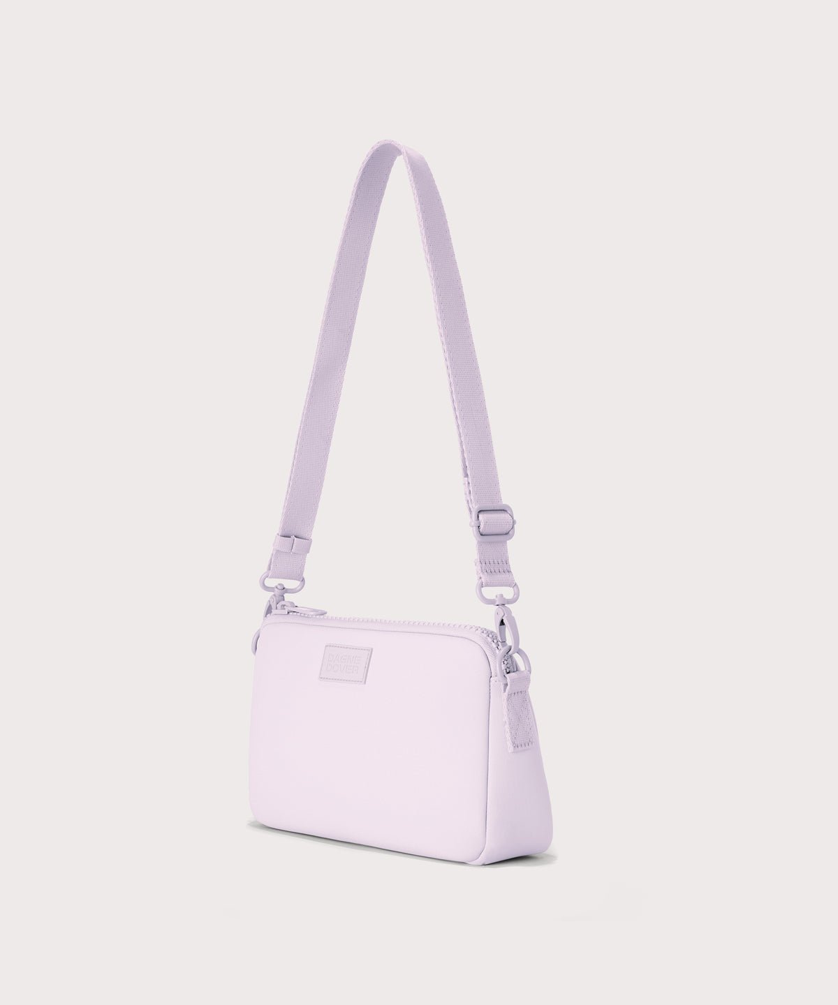 Dagne Dover Nora Shoulder Bag in  a soft purple with grey undertones, side angle.
