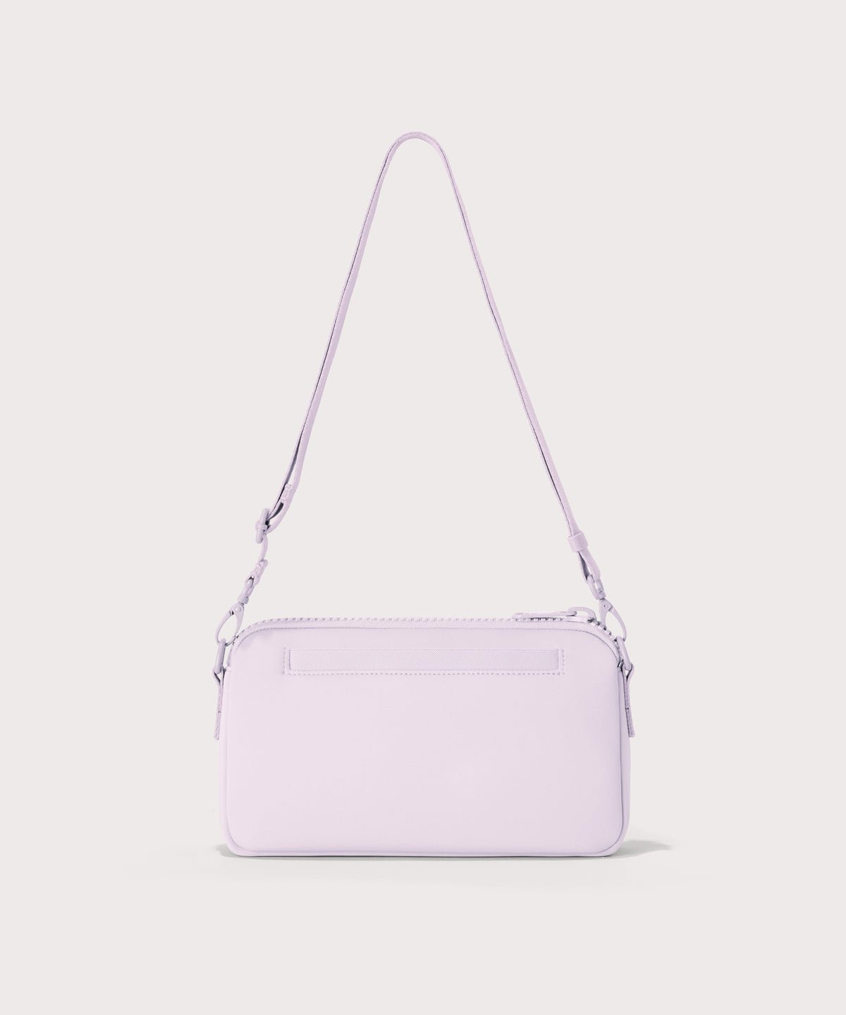 Dagne Dover Nora Shoulder Bag in  a soft purple with grey undertones, back angle.
