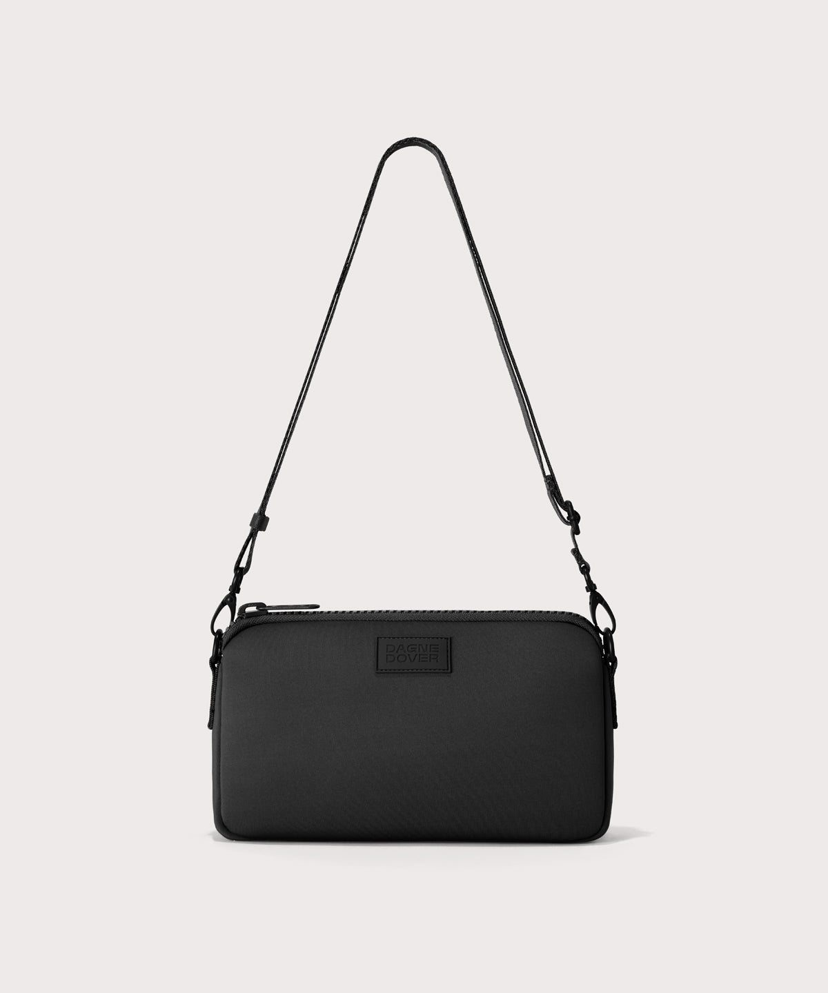 Dagne Dover Nora Shoulder Bag in black, side angle.
