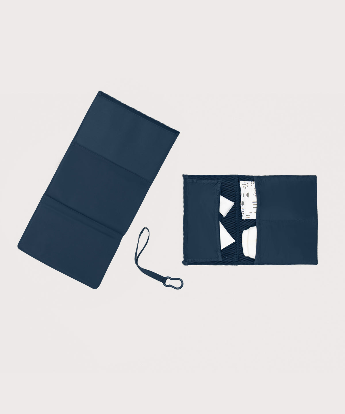 Dagne Dover Joey Changing Kit in moonlight unfolded, revealing the detachable changing mat.
