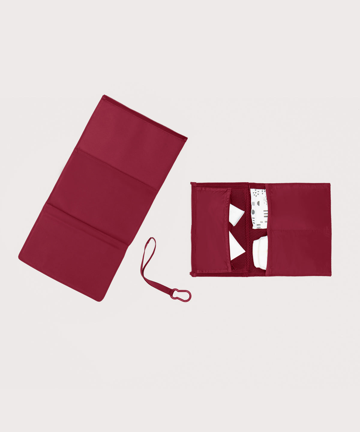 Dagne Dover Joey Changing Kit in spice unfolded, revealing the detachable changing mat.
