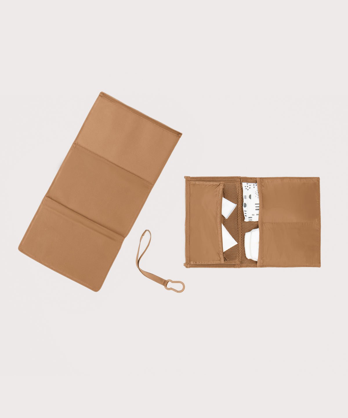 Dagne Dover Joey Changing Kit in camel brown unfolded, revealing the detachable changing mat.
