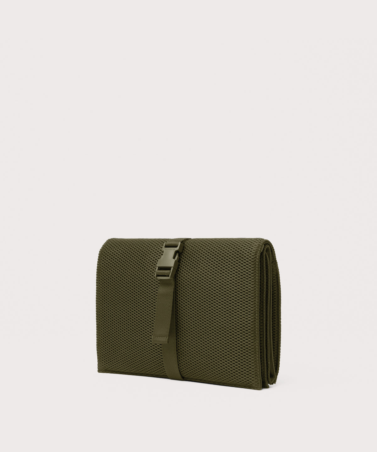 Dagne Dover Joey Changing Kit in dark moss seen from an angle.
