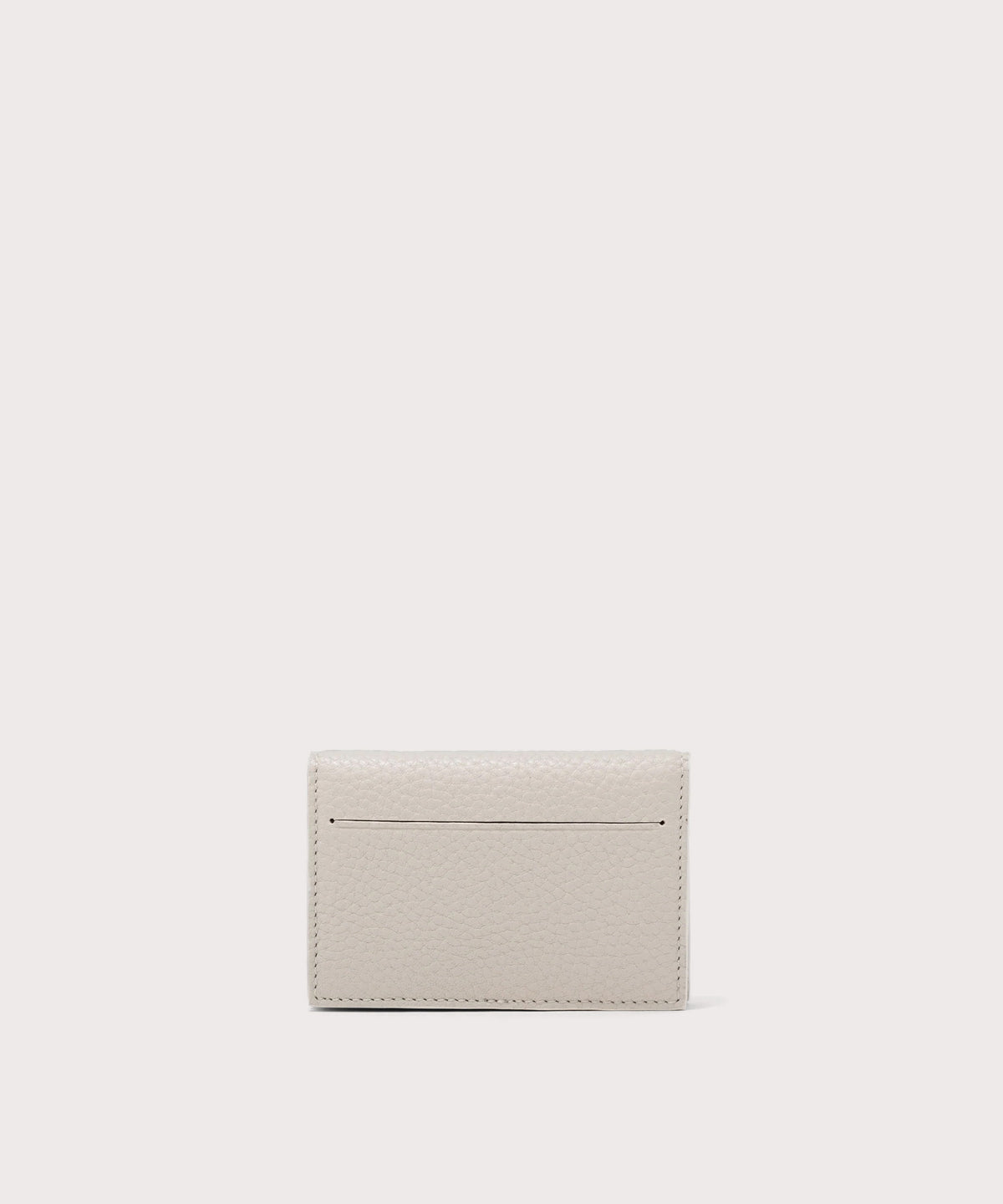 Dagne Dover Accordion Card Case in white revealing the external card slot.