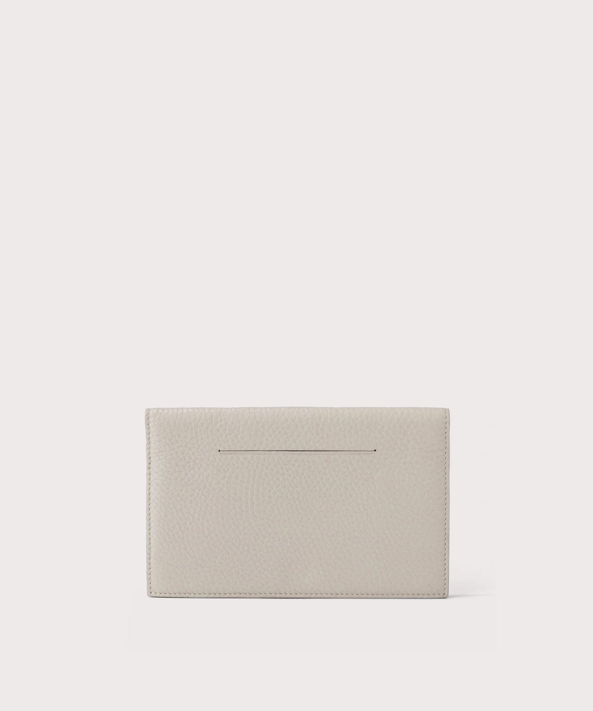 dagne-2025-Dagne Dover Accordion Travel Wallet in light grey, revealing the external card slot.
