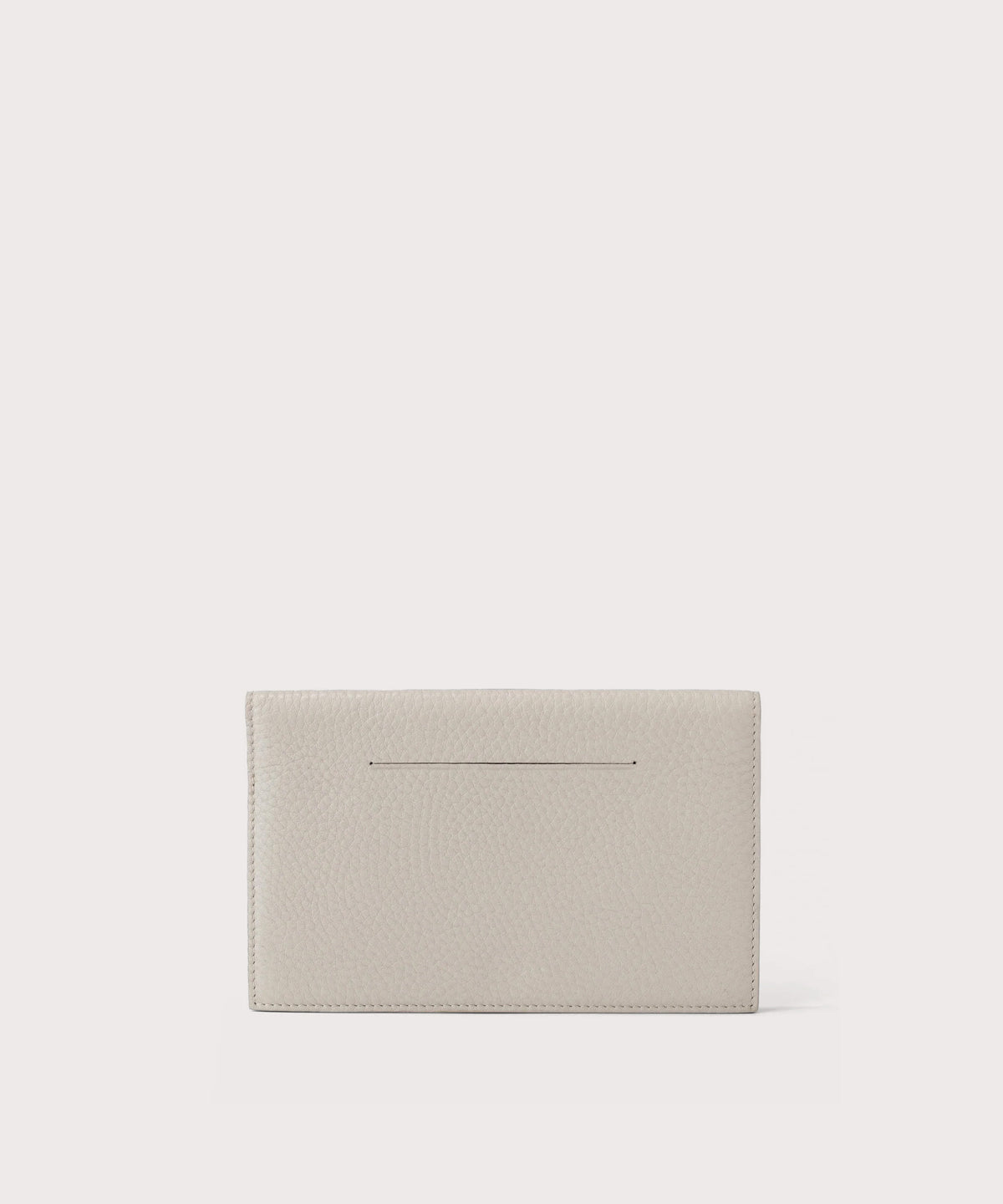 Dagne Dover Accordion Travel Wallet in white, revealing the external card slot.
