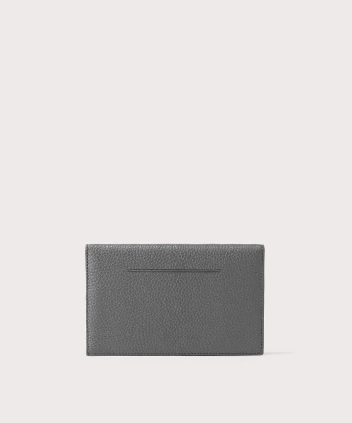 dagne-2025-Dagne Dover Accordion Travel Wallet in grey, revealing the external card slot.
