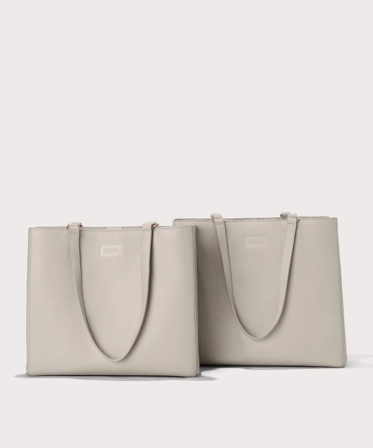 Dagne Dover medium and medium Allyn Totes in light grey.
