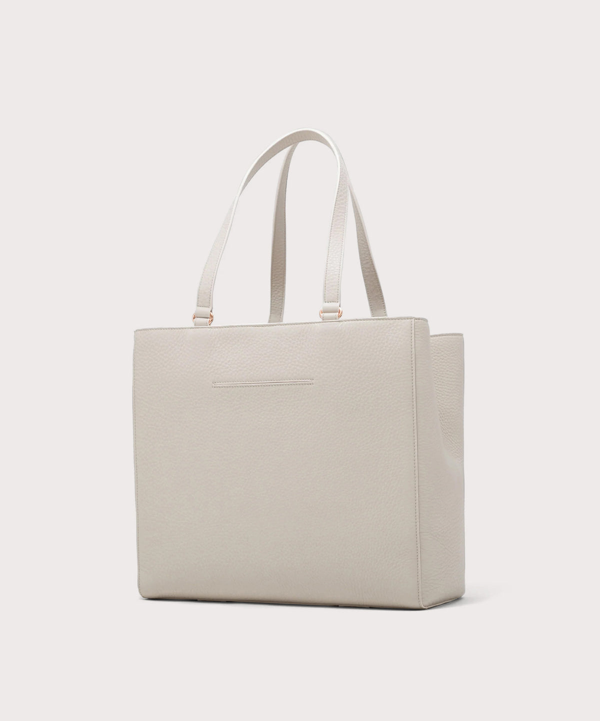 Dagne Dover large Allyn Tote in grey with the exterior slip pocket.
