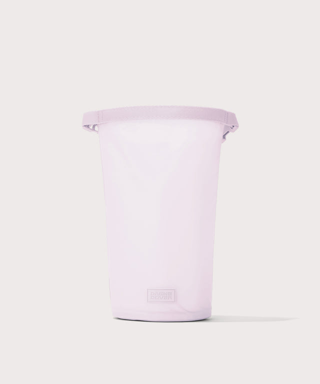 Dagne Dover Rae Roll-Top Dry Bag in a soft purple with grey undertones fully unrolled at 11 inches high.
