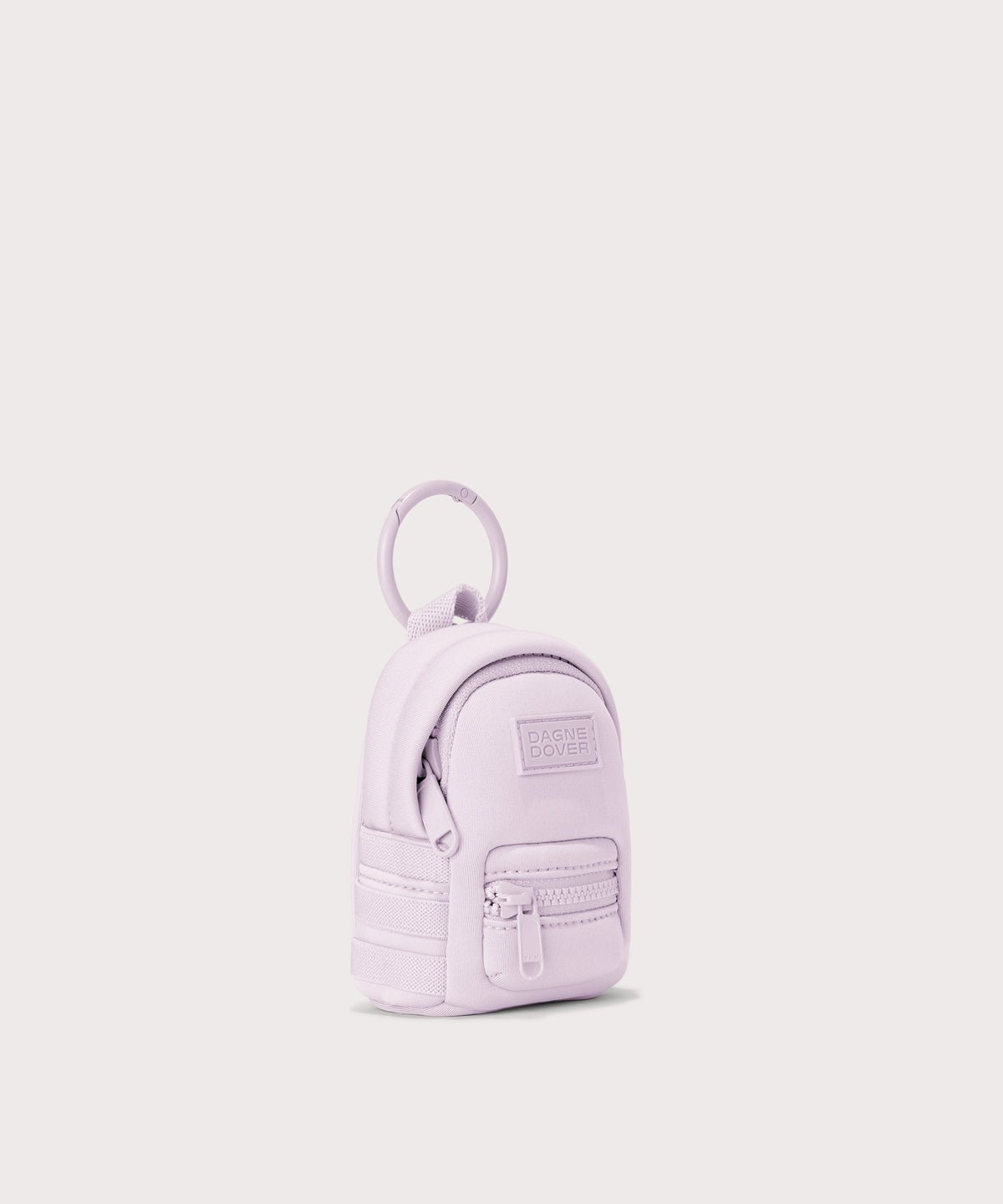 Dagne Dover Dakota Keychain in a soft purple with grey undertones seen from an angle.
