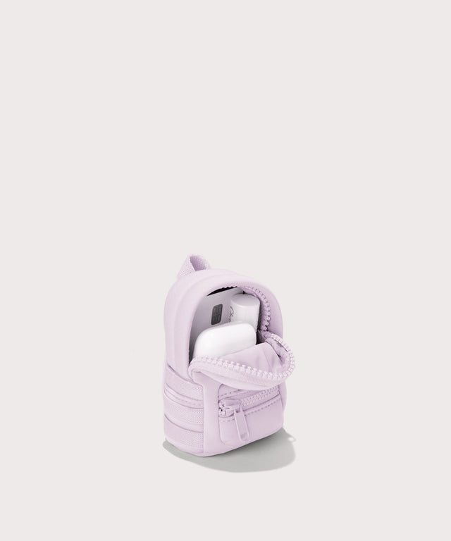 Dagne Dover Dakota Keychain in a soft purple with grey undertones unzipped, showing interior.