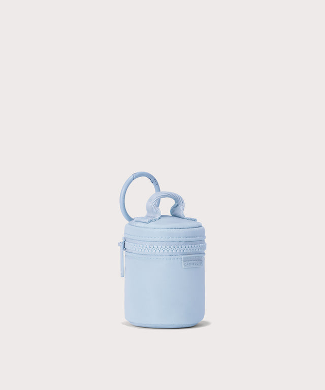 Dagne Dover Mila Keychain in a an airy, lighter sky blue seen from an angle.

