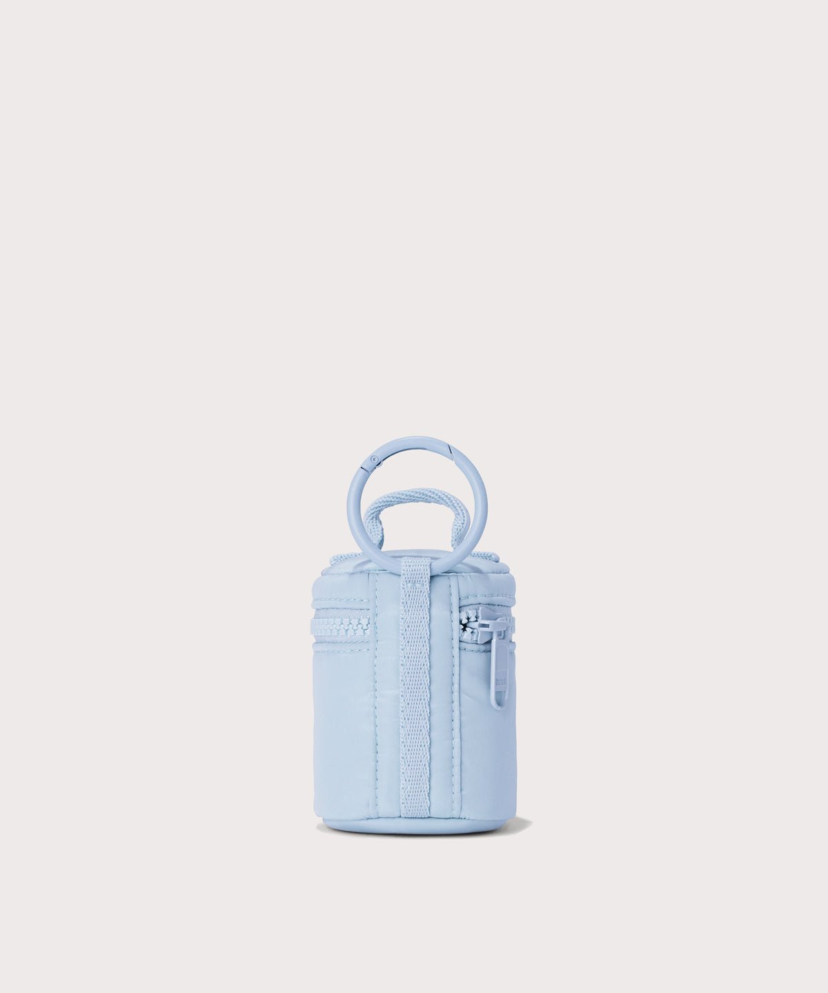 Dagne Dover Mila Keychain in a an airy, lighter sky blue seen from the back.
