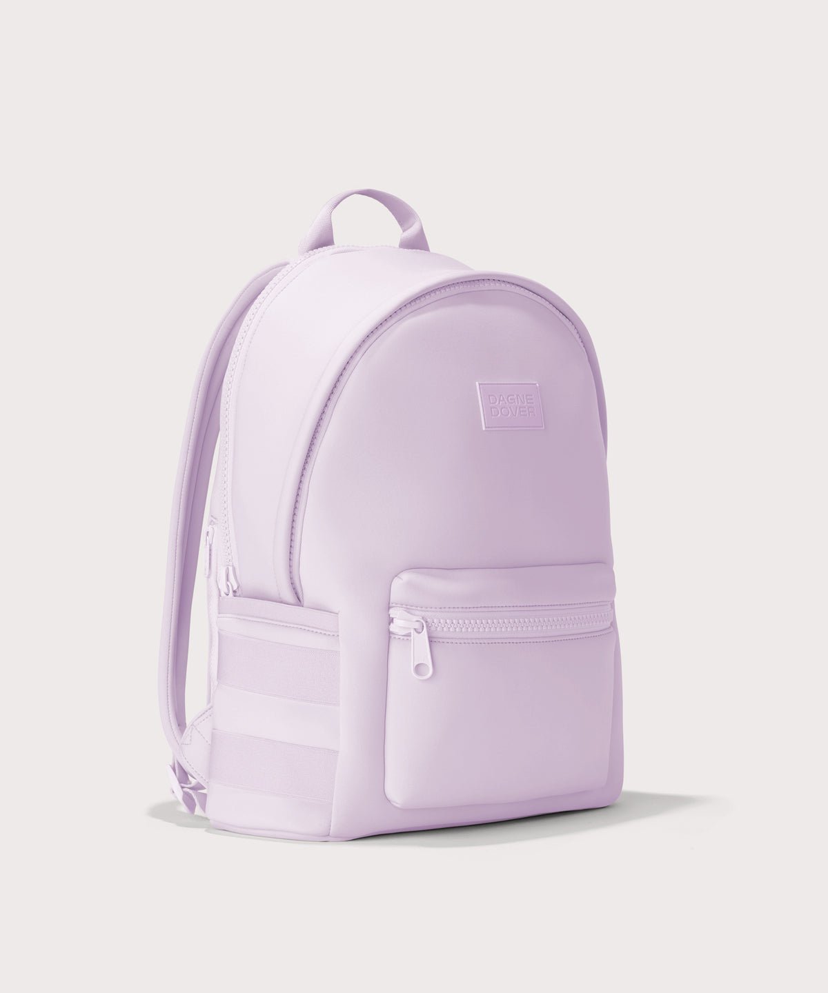 Dagne Dover large Dakota Neoprene Backpack in A soft purple with grey undertones seen from an angle.
